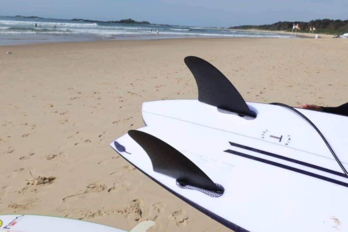 Surfboards fins on the beach