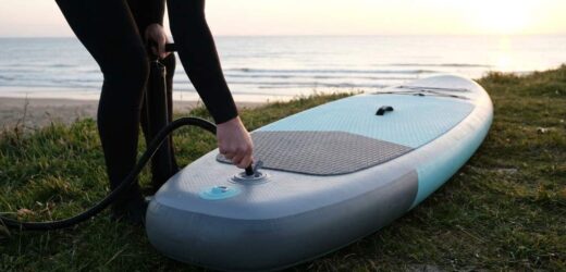 Funwater inflatable paddle board fully inflated on calm water
